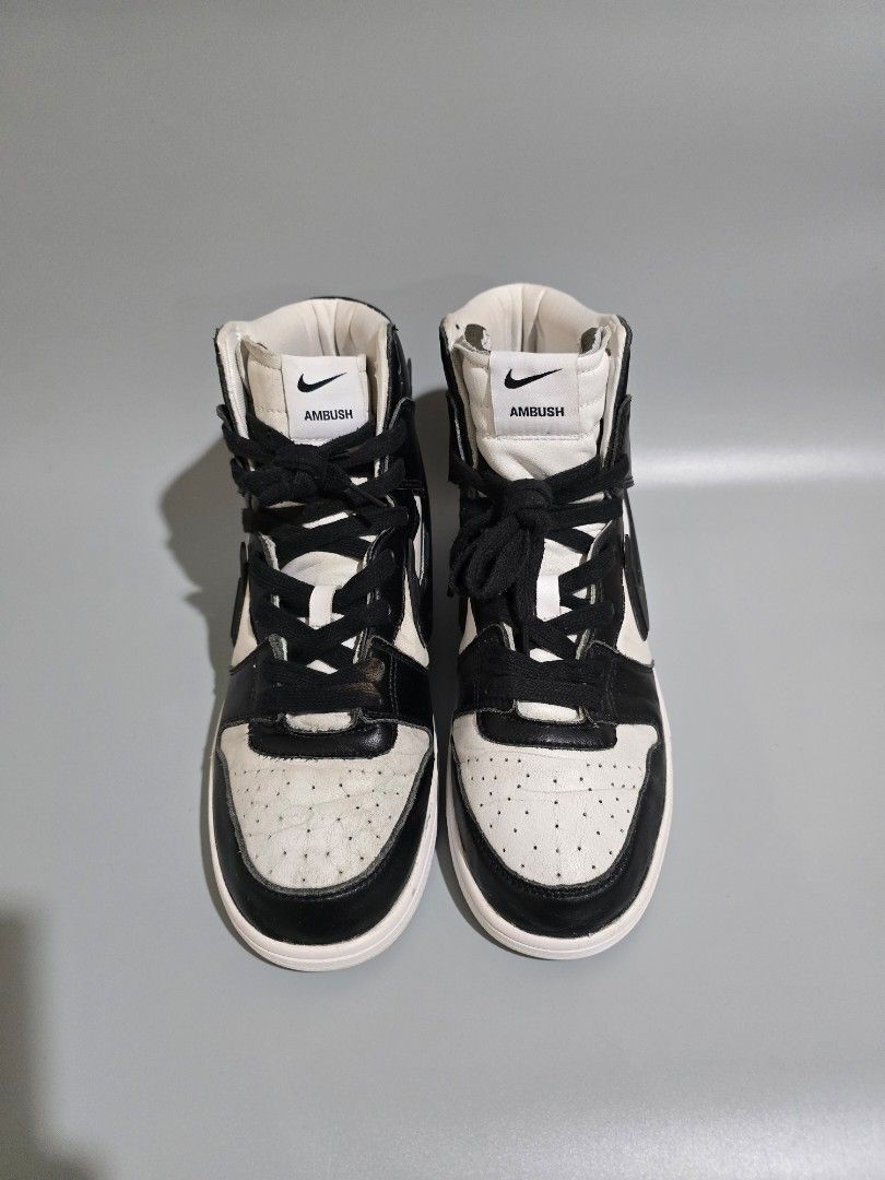 Nike Dunk High x Ambush Black White (Category: Sneakers) located in Baguio. Submitted by pinkpixie (Listing ID 1427392164, Image 3). Description: - Nike Dunk High Ambush - Black and White colorway - Size: US 9.5 - Leather upper - Padded tongue and collar - Iconic Nike Swoosh - White midsole, black outsole - Includes original laces.