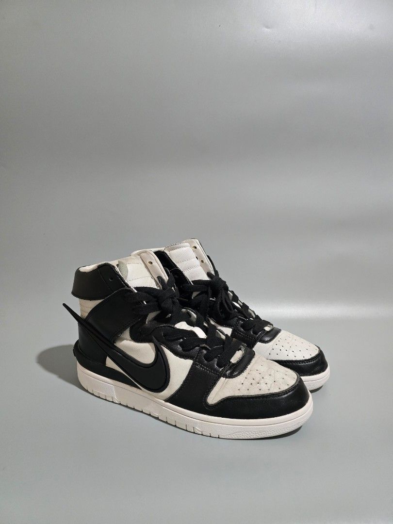 Nike Dunk High x Ambush Black White (Category: Sneakers) located in Baguio. Submitted by pinkpixie (Listing ID 1427392164, Image 2). Description: - Nike Dunk High Ambush - Black and White colorway - Size: US 9.5 - Leather upper - Padded tongue and collar - Iconic Nike Swoosh - White midsole, black outsole - Includes original laces.