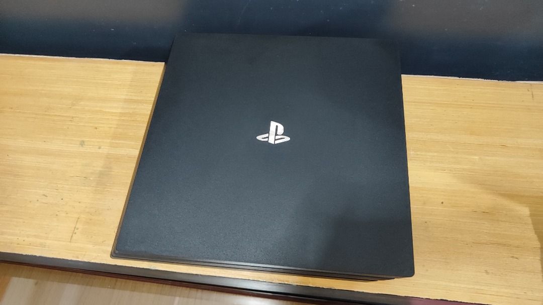 PlayStation 4 Pro Console (Category: PlayStation) located in Antipolo. Submitted by whatshopdude (Listing ID 1427391051, Image 2). Description: PlayStation 4 Pro Console Includes: -PlayStation 4 Pro console -Two controllers -Controller charging dock -All necessary cables -PS4 Pro Stand -No history of repair -All Button is working -All lights working Issue: Joystick rubber has damage but not stick drift..