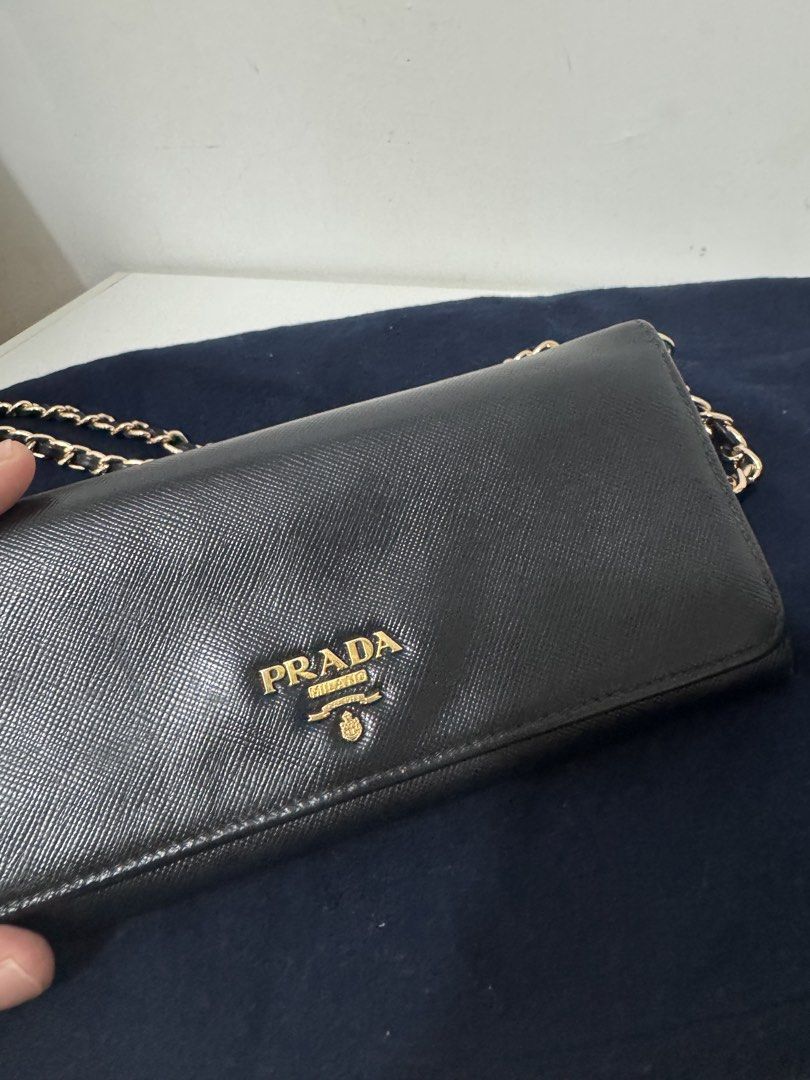 Prada Chain Wallet (Category: Luxury Bags & Wallets) located in Bulacan. Submitted by everythinggood26 (Listing ID 1427350839, Image 2). Description: 💯Authentic! ❤️ Made in italy code And stamp code number Note: This is a provided sling can be a wallet only. .
