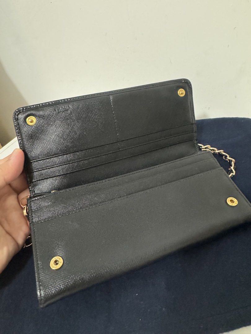 Prada Chain Wallet (Category: Luxury Bags & Wallets) located in Bulacan. Submitted by everythinggood26 (Listing ID 1427350839, Image 3). Description: 💯Authentic! ❤️ Made in italy code And stamp code number Note: This is a provided sling can be a wallet only. .