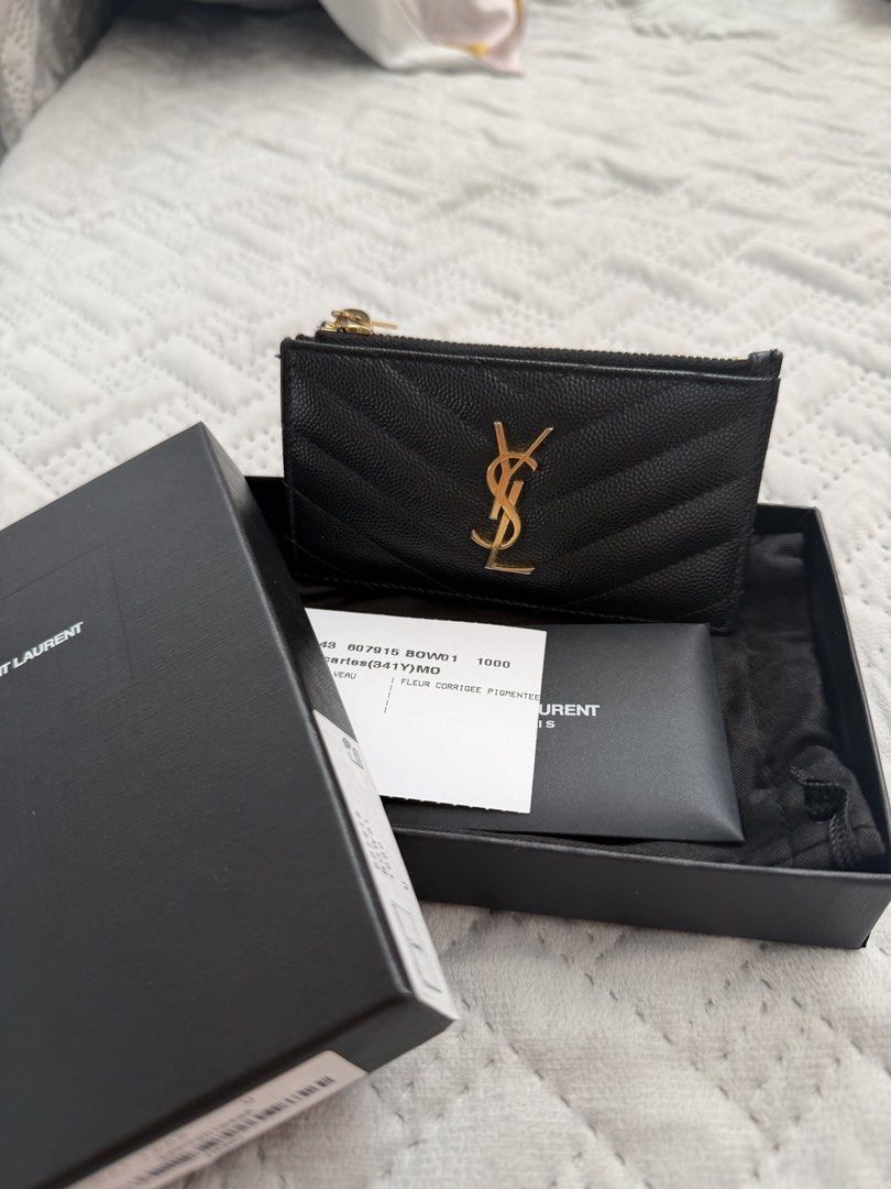 Saint Laurent YSL Cardholder (Category: Luxury Bags & Wallets) located in Mexico. Submitted by jvsss13 (Listing ID 1427314064, Image 1). Description: Selling my personal stuff YSL cardholder bought in YSL Solaire. Complete with receipt same serial number. No more paper bag but I can give Dior paper bag. RFS: switching to sleeker wallet, trade to Loewe, Celine or LV wallet .