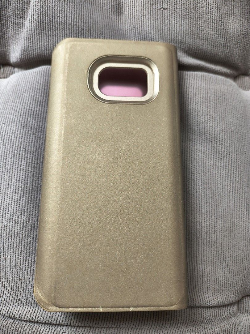 Samsung S7 Clear View standing cover phone casing (Category: Cases & Sleeves) located in Quezon City. Submitted by drkco (Listing ID 1427375479, Image 3). Description: Never used, just stored. Still comes w/ its plastic covering and case..