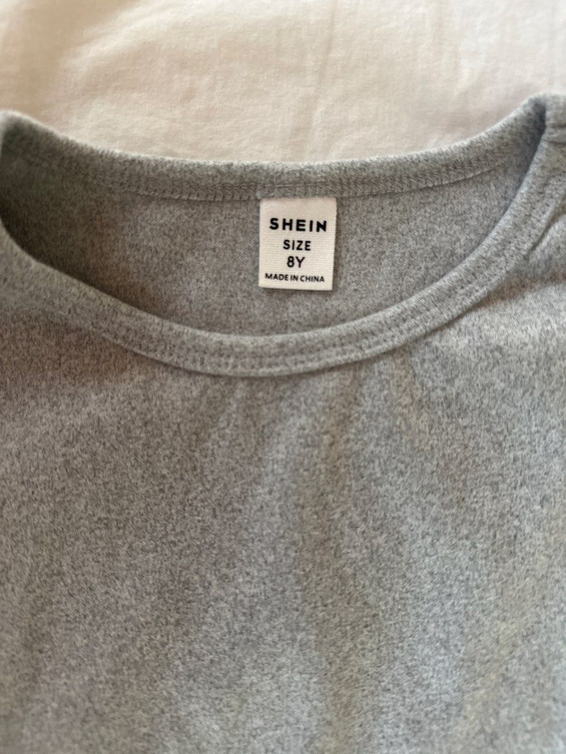 Shein Long Sleeve Warmer - Gray - Size 8Y (Category: Babies & Kids Fashion) located in Muntinlupa City. Submitted by shopnb (Listing ID 1427383568, Image 3). Description: - Shein long sleeve warmer - Gray color - Size 8Y - Suitable for layering.