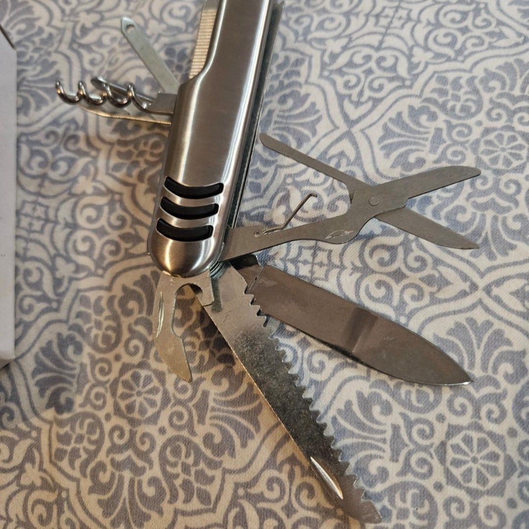Stainless Steel Multi-tool (Category: Construction Tools & Equipment) located in Manila. Submitted by smartluxeph (Listing ID 1427378871, Image 3). Description: 🔧 Multi-Tool Pocket Knife (Swiss-style) – Stainless Steel 🛠️✨ 💎 All-in-one tool for everyday use 💎 Includes: knife, scissors, saw, bottle opener, corkscrew, nail file + more 💎 Compact & easy to carry (EDC essential 👀) 💎 Durable stainless steel body 🏕️ Perfect for: • Travel / campi