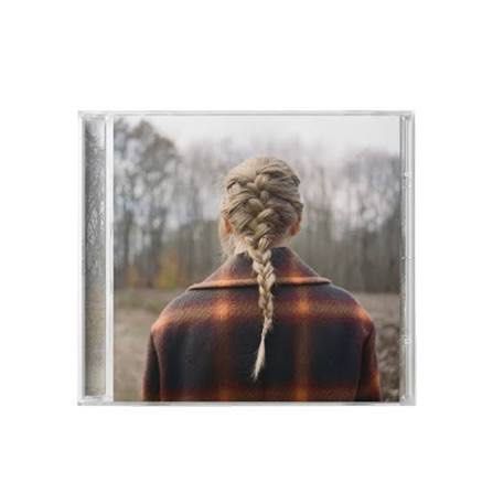 Taylor Swift Evermore Standard CD (Category: CDs & DVDs) located in Manila. Submitted by popdivaalbumss (Listing ID 1427435843, Image 2). Description: - Taylor Swift's 'Evermore' album CD - Features the album cover with Taylor Swift and a braid - Includes tracks: 'willow', 'champagne problems', 'evermore (feat. Bon Iver)', and more - Sealed and New Limited Stock Only.