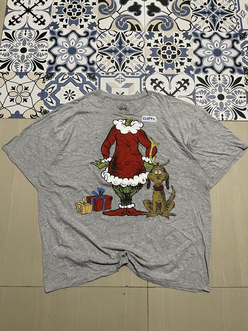 The Grinch 2XL T-shirt (Category: Tshirts & Polo Shirts ) located in Manila. Submitted by stuzzygod (Listing ID 1427450672, Image 1). Description: The Grinch (Printed🏷️) Dimes 25*29.5 Size XXL Good condition Color rate 9/10 No issue.