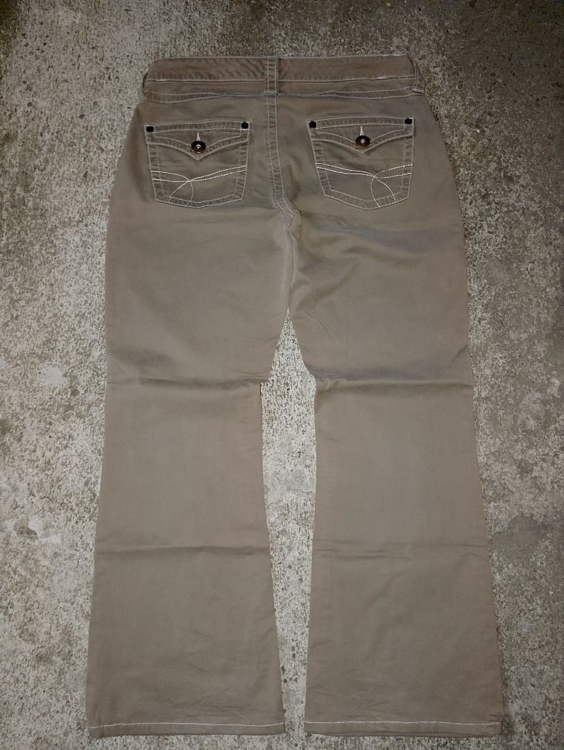 Tommy Hilfiger Flared Pants (Category: Trousers) located in Calamba. Submitted by thriftones (Listing ID 1427470127, Image 2). Description: Length: 40 Waist: 34-36 Thigh: 13 Hem: 11 Condition: 9/10 No issues Negotiable!!!.