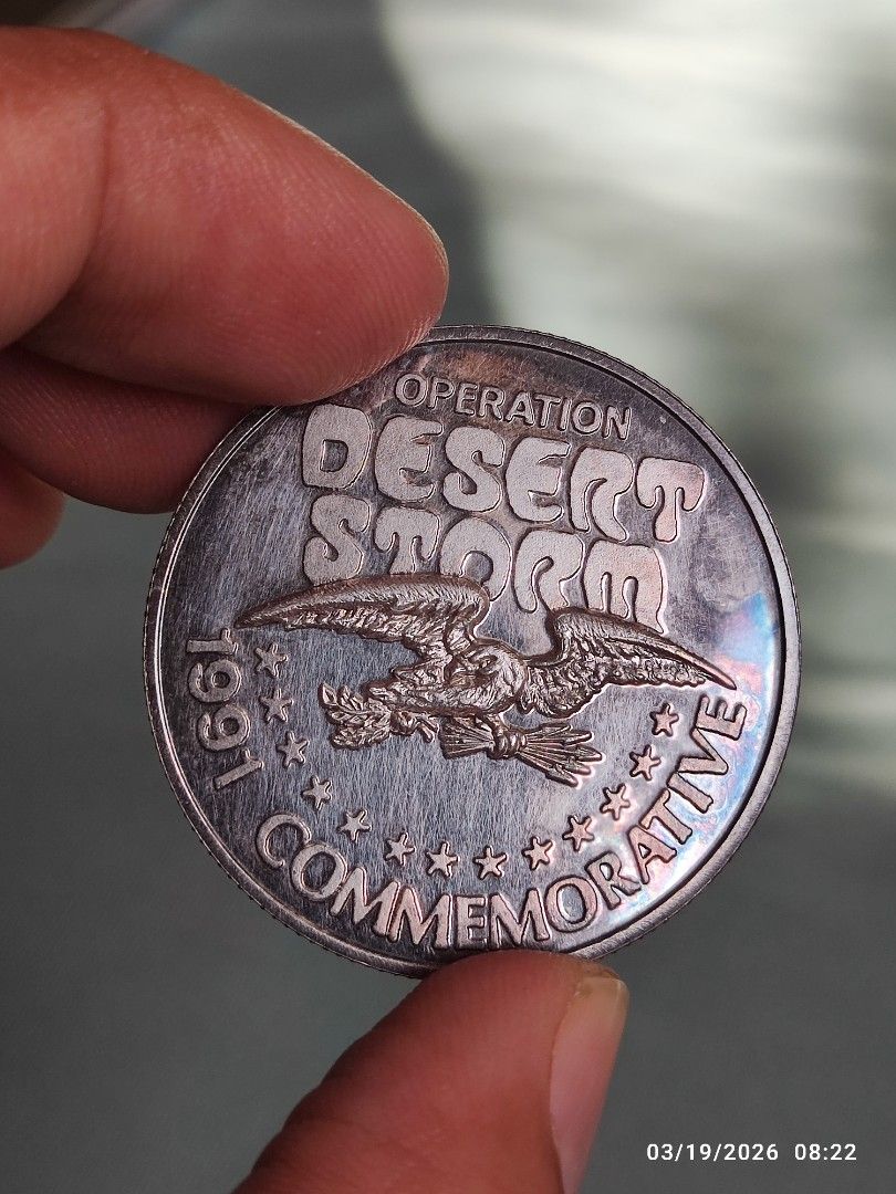 1 oz silver (Category: Currency) located in Tagum. Submitted by cs1907 (Listing ID 1427315098, Image 3). Description: Commemorative coin features the USS Midway on one side and commemorates Operation Desert Storm on the other. The coin is marked with "999 Fine Silver" and "CV-41". The Operation Desert Storm side features an eagle design. A great collectible item for history enthusiasts or coin collectors..
