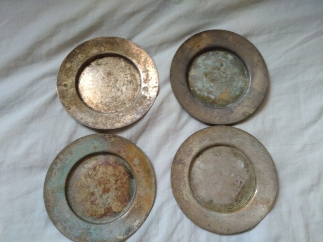 Vintage Silver Coasters Set of 4 (Category: Other Kitchenware & Tableware) located in Manila. Submitted by racgeb (Listing ID 1427326554, Image 2). Description: Set of four vintage silver coasters. Each coaster has a circular design with a slightly raised edge. The undersides show markings. Perfect for adding a touch of elegance to your table setting. Vintage EPNS bradleigh plate silver Sheffield england Authentic 100% good for display & collecti