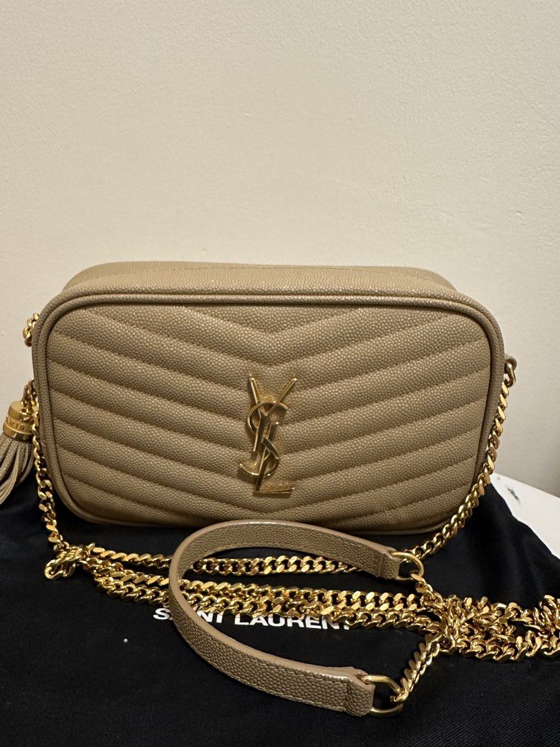 [AUTHENTIC] YSL Beige Mini Lou Camera Bag (Category: Luxury Bags & Wallets) located in Pasig City. Submitted by reg.mnl (Listing ID 1427436401, Image 2). Description: YSL Beige Mini Lou Camera Bag (Grained Leather) - preloved - Guaranteed Authentic with free Entrupy - with box, dustbag, cards and Entrupy - condition: very good, with very slight hairline scratches on the front logo, clean exterior & interior, no foul smell Please note that refund/