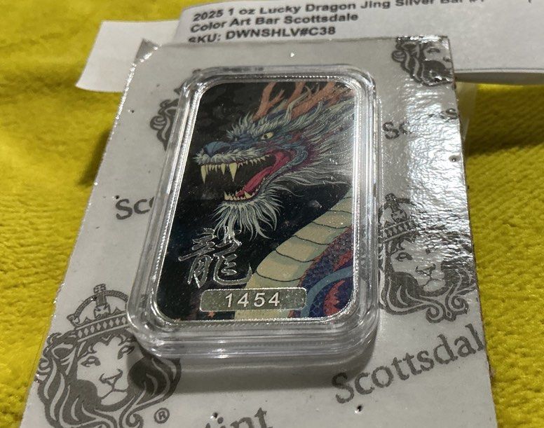 1 oz Dragon Bar Silver #1/5”Jing” (Category: Currency) located in Del Monte. Submitted by bernapi63 (Listing ID 1424173027, Image 2). Description: - 1 oz Dragon Bar Silver - Features a detailed and colorful dragon design. - Limited edition: #1 of 5 , 5000 pcs Mintage Each serialized numbered - Perfect for collectors. - BU brilliant and Uncirculated.