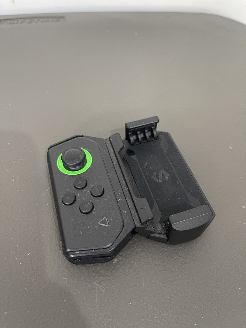 8BitDo N30 Pro 2 & Black Shark Controller (Category: Controllers) located in Muntinlupa City. Submitted by snapbackandmore (Listing ID 1424198046, Image 3). Description: - Includes 8BitDo N30 Pro 2 controller (retro SNES design) Plus Black Shark controller (black with green accents) - Black Shark controller features a phone clip .