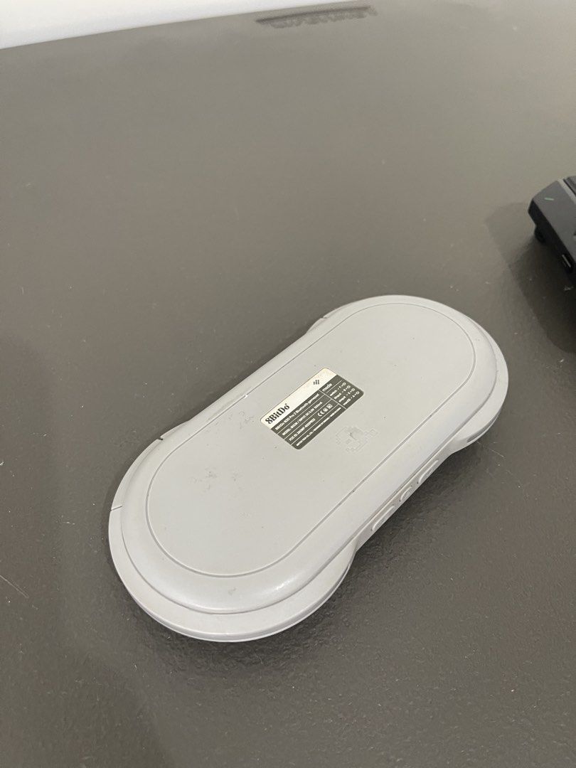 8BitDo N30 Pro 2 & Black Shark Controller (Category: Controllers) located in Muntinlupa City. Submitted by snapbackandmore (Listing ID 1424198046, Image 2). Description: - Includes 8BitDo N30 Pro 2 controller (retro SNES design) Plus Black Shark controller (black with green accents) - Black Shark controller features a phone clip .