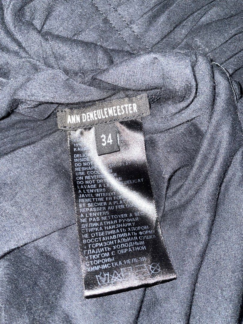 Ann Demeulemeester Mid-length dress (Category: Dresses) located in Antipolo. Submitted by etherealtech7 (Listing ID 1424292658, Image 3). Description: Ann Demeulemeester black dress, long sleeves, with pleats in front and behind, it can be worn in two directions. Size 34. Has stretch..