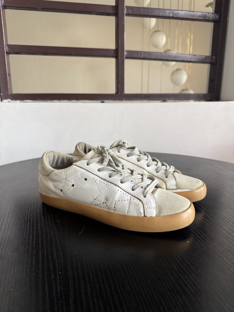 Authentic Golden Goose White & Gray (Category: Sneakers) located in Manila. Submitted by lessstuffstudio (Listing ID 1424255030, Image 1). Description: 🎆 3.3 Sneaker Sale 🎆 👟 Golden Goose White & Gray Size 38– 100% Authentic 💰1,500 (Slightly negotiable for serious buyers) 🔥 Better price if purchasing 2 or more items 📍 Doña Soledad Parañaque City 📦 Mailing available (buyer covers) 💳 GCash / Bank Transfer Condition: 7/10 Colorway: White and