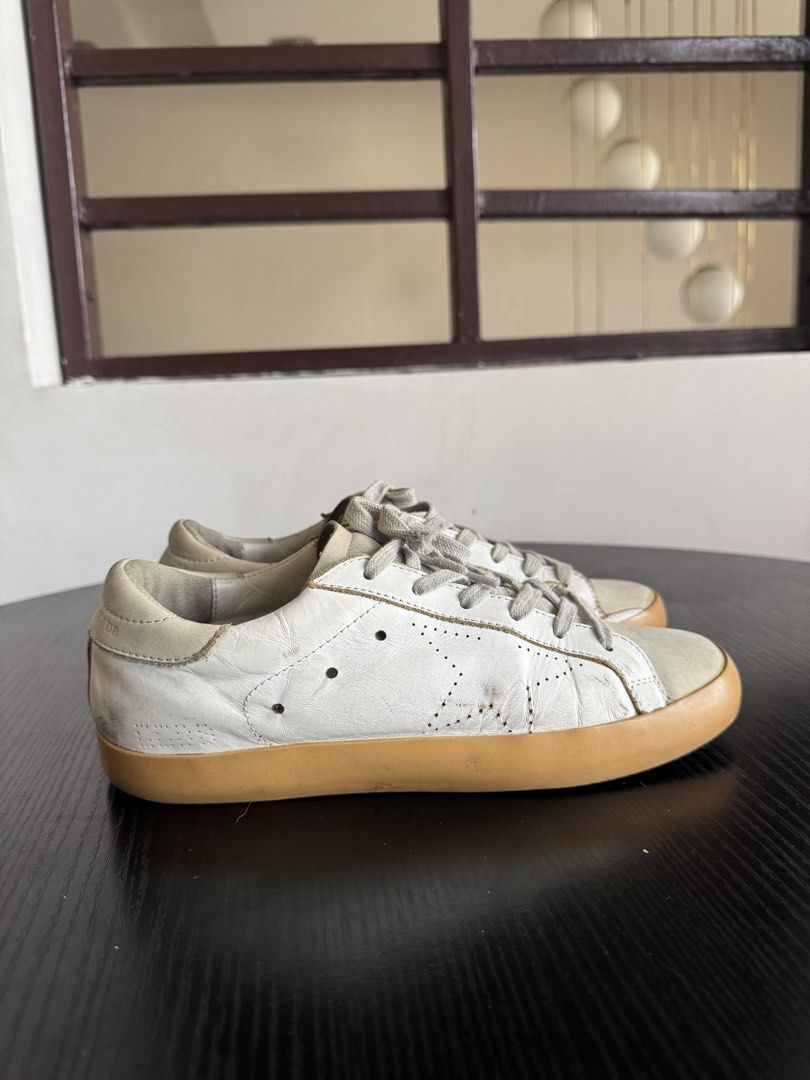 Authentic Golden Goose White & Gray (Category: Sneakers) located in Manila. Submitted by lessstuffstudio (Listing ID 1424255030, Image 2). Description: 🎆 3.3 Sneaker Sale 🎆 👟 Golden Goose White & Gray Size 38– 100% Authentic 💰1,500 (Slightly negotiable for serious buyers) 🔥 Better price if purchasing 2 or more items 📍 Doña Soledad Parañaque City 📦 Mailing available (buyer covers) 💳 GCash / Bank Transfer Condition: 7/10 Colorway: White and