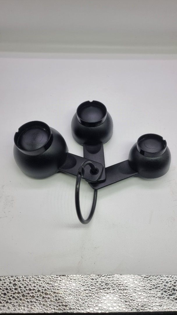 Black Measuring Cups Set (Category: Bakeware) located in Marikina City. Submitted by andreah_16 (Listing ID 1424338221, Image 1). Description: - Set of three black measuring cups - Different sizes for various needs - Connected by a ring for easy storage - Made of durable plastic - Ideal for cooking and baking.