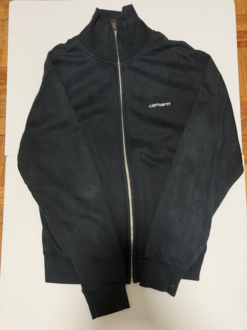 Carhartt Full Zip Jacket (Category: Coats, Jackets and Outerwear) located in Caloocan City. Submitted by _mitsuki (Listing ID 1424280336, Image 1). Description: ‼️ DECLUTTERING ‼️ Model Height: 5'6 Model Weight: 69.5kg Carhartt full zip jacket in black. Features a small Carhartt logo on the chest. The jacket has a full zip closure, two side pockets, and ribbed cuffs and hem. Made of 100% cotton. Size S. MOP: Unionbank, MariBank, GoTyme MOD: Any c