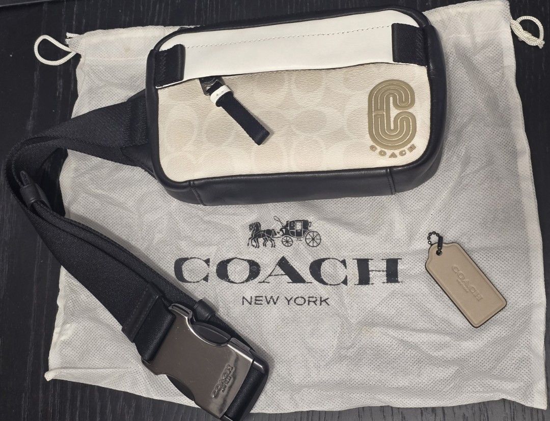 Coach Crossbody & Belt Bag (Category: Luxury Bags & Wallets) located in Cebu City. Submitted by marchander (Listing ID 1424229028, Image 1). Description: - Authentic Coach belt bag - Signature black and white Coach pattern - Main compartment and interior pocket - Includes dust bag and Coach tag - Adjustable strap with metal buckle - Zipper closure - Rarely used / like new.