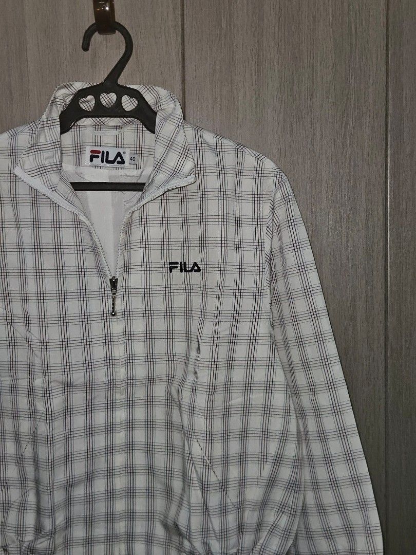 Fila Tennis Plaid Jacket (Category: Coats, Jackets and Outerwear) located in Candon. Submitted by itssummer08 (Listing ID 1424219744, Image 1). Description: - Fila plaid jacket - Size 40, Medium to Large womens oversized boxy fit. - Zipper closure - Embroidered Fila logo - Classic plaid pattern (white, black, red) - Collar and long sleeves L 22 W21.5 Boxy fit.