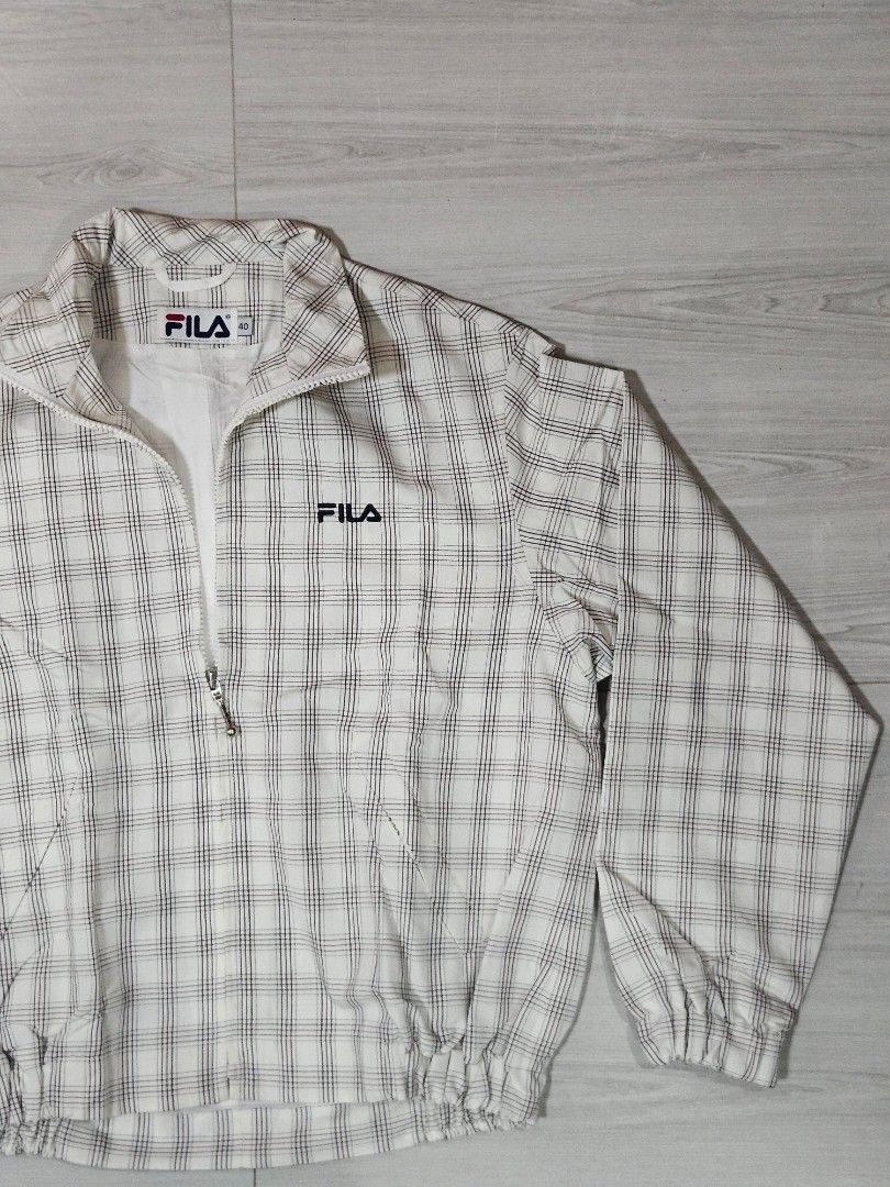 Fila Tennis Plaid Jacket (Category: Coats, Jackets and Outerwear) located in Candon. Submitted by itssummer08 (Listing ID 1424219744, Image 3). Description: - Fila plaid jacket - Size 40, Medium to Large womens oversized boxy fit. - Zipper closure - Embroidered Fila logo - Classic plaid pattern (white, black, red) - Collar and long sleeves L 22 W21.5 Boxy fit.