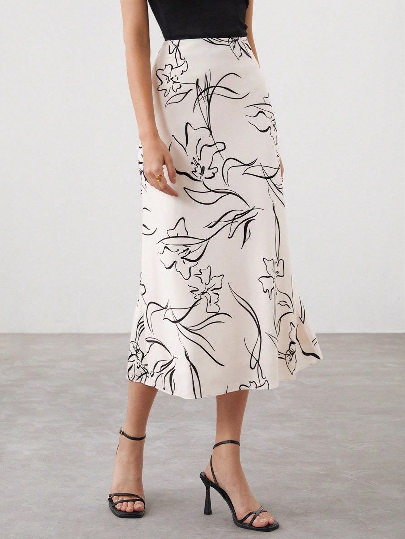 Floral Print Midi Skirt (Category: Skirts) located in Palayan City. Submitted by feyrposh (Listing ID 1424213117, Image 2). Description: Product measurement:XS Waist: 25.5” Hip: 35.8” Length: 31.3” 📌200+SF.