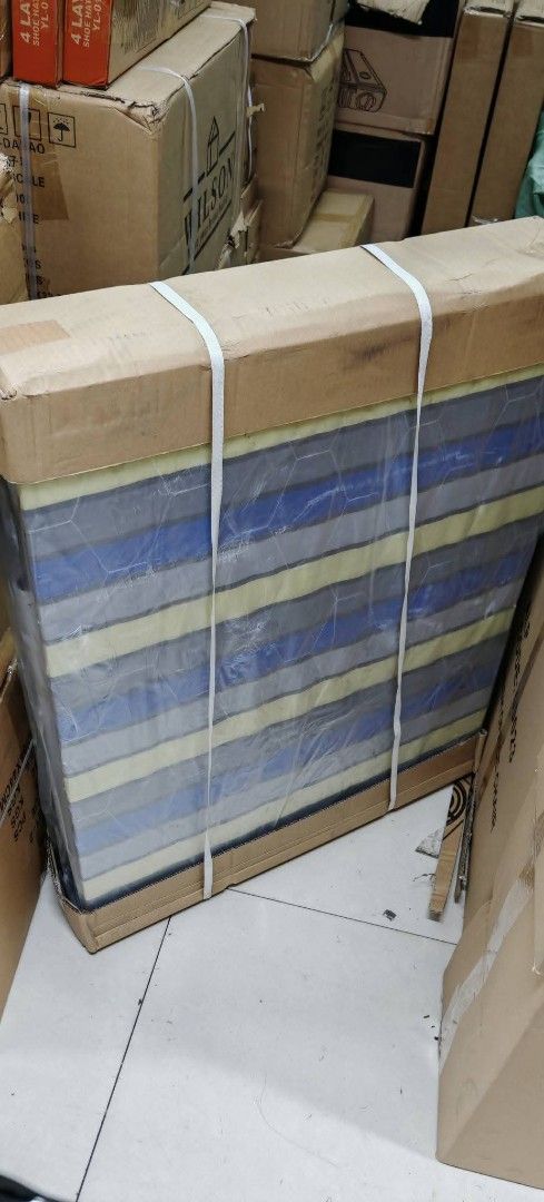 Folding Bed with Mattress (Category: Bed Frames & Mattresses) located in Manila. Submitted by nixdcruz (Listing ID 1424293582, Image 3). Description: Folding bed comes with a mattress. It features a striped mattress design and a white metal frame. The bed folds up for easy storage. The bed is still in its original packaging..