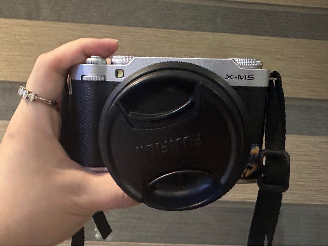 Fujifilm X-M5 Camera with Lens (Category: Cameras) located in Manila. Submitted by brielliant (Listing ID 1424323756, Image 1). Description: Fujifilm xm5 with fujinon 15-45mm lens No issues Low shutter count: 1938 as of posting Some light scratches on the bottom because I used a handgrip, you can only see it, if you really look for it. Meetups only for this item. RFS: buying another camera Meetups: Greenhills mall.