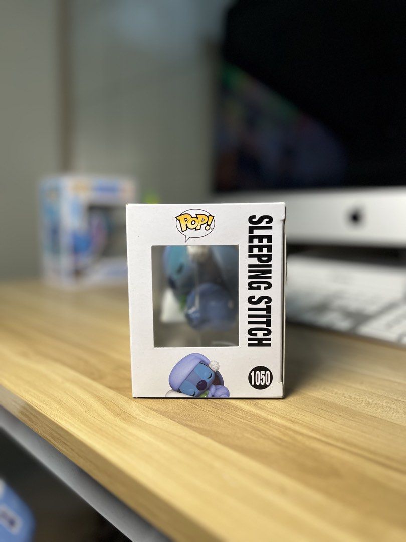 Funko Pop! Disney Lilo & Stitch Sleeping Stitch #1050 (Category: Designer & Blind Box Toys) located in Dasmarinas. Submitted by margo09 (Listing ID 1424181865, Image 2). Description: Funko Pop! features Sleeping Stitch from Disney's Lilo & Stitch. It is a Hot Topic exclusive, with the number 1050. The box shows Stitch sleeping on a pillow. The back of the box displays other Lilo & Stitch Funko Pop! figures. It is a collectible item for Disney fan