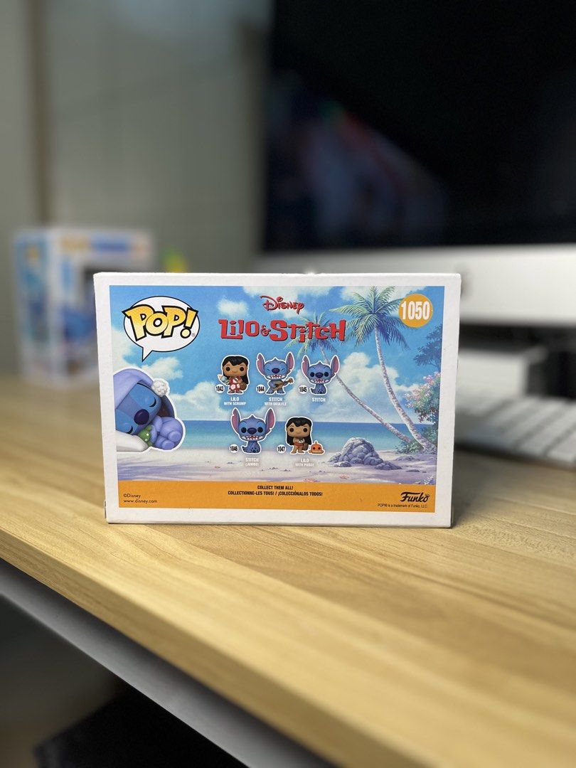Funko Pop! Disney Lilo & Stitch Sleeping Stitch #1050 (Category: Designer & Blind Box Toys) located in Dasmarinas. Submitted by margo09 (Listing ID 1424181865, Image 3). Description: Funko Pop! features Sleeping Stitch from Disney's Lilo & Stitch. It is a Hot Topic exclusive, with the number 1050. The box shows Stitch sleeping on a pillow. The back of the box displays other Lilo & Stitch Funko Pop! figures. It is a collectible item for Disney fan