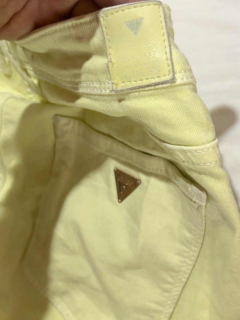 Guess W91B41 Yellow Jeans Size 25 (Category: Jeans) located in Dagupan City. Submitted by againandadorned (Listing ID 1424187566, Image 2). Description: These Guess jeans are a vibrant yellow color. They feature the Guess logo on the back pocket and a small logo patch on the back waistband. The size is 25, and the style is W42A27 W4TH0 4. The jeans are made in Turkey. The material composition includes cotton, viscose, and elastane..