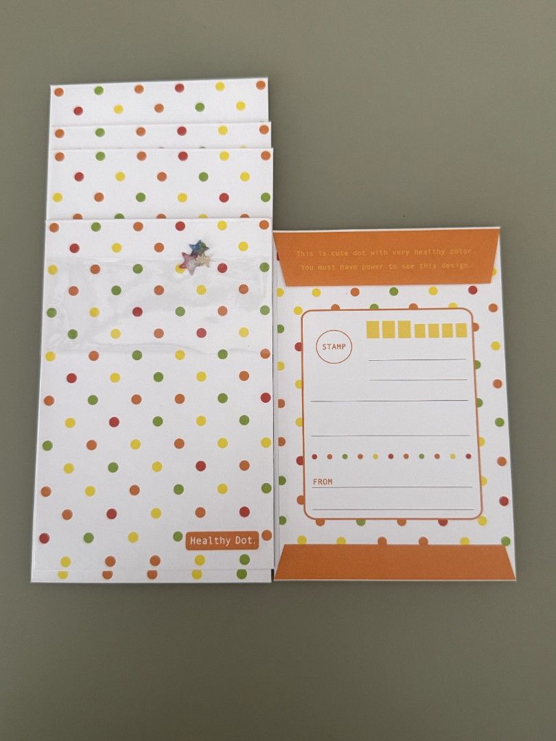Healthy Dot Envelopes (Category: Stationery & School Supplies) located in Manila. Submitted by batoicexan16856 (Listing ID 1424182121, Image 1). Description: - Set of colorful dot-patterned envelopes. - Features red, yellow, and green dots on a white background. - Includes one envelope with an orange flap and text. - Envelopes have space for 'From' and 'To' details..