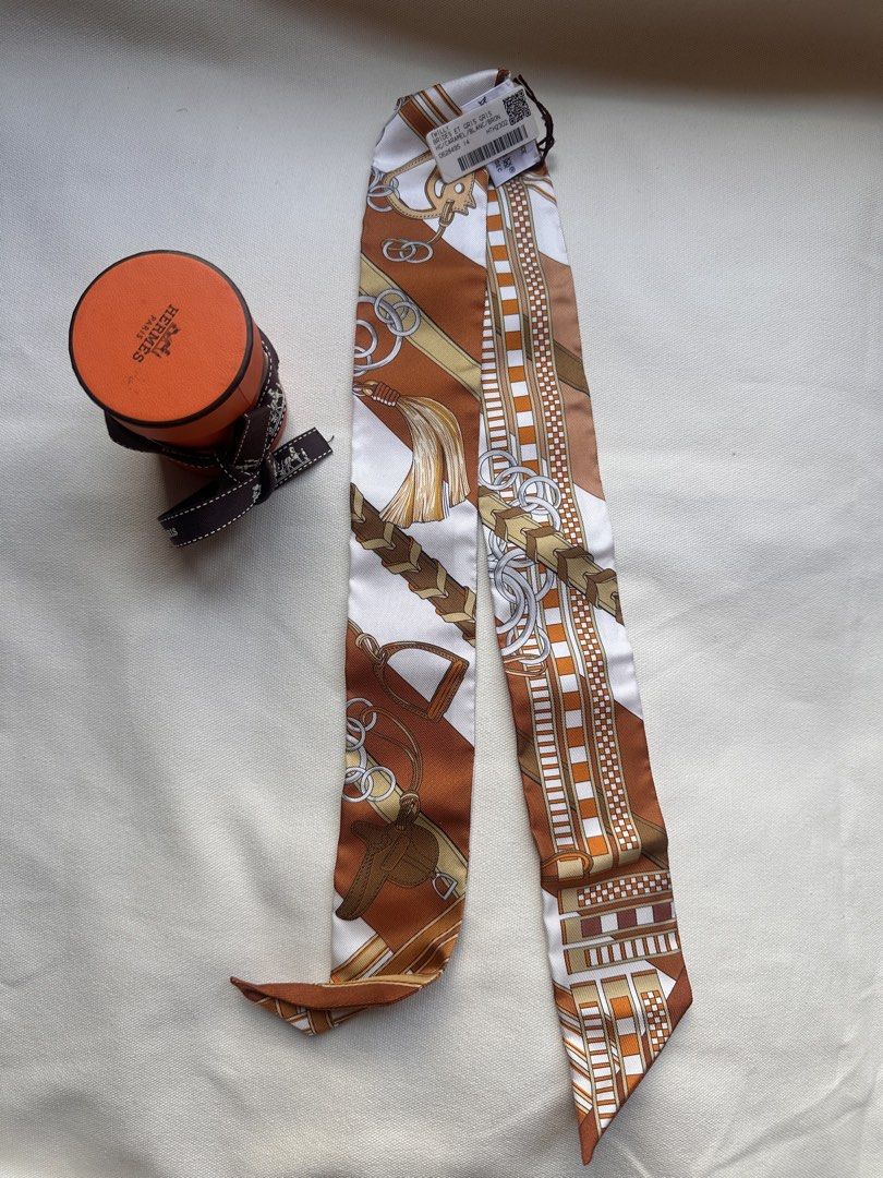 Hermès Silk Twilly Scarf (Category: Scarves) located in Taguig. Submitted by zhuluxeitems (Listing ID 1424303616, Image 1). Description: All are brandnew and Authentic. Below SRP Kindly ss the design you like then message me. Pick up BGC Taguig .