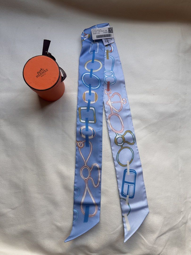 Hermès Silk Twilly Scarf (Category: Scarves) located in Taguig. Submitted by zhuluxeitems (Listing ID 1424303616, Image 2). Description: All are brandnew and Authentic. Below SRP Kindly ss the design you like then message me. Pick up BGC Taguig .