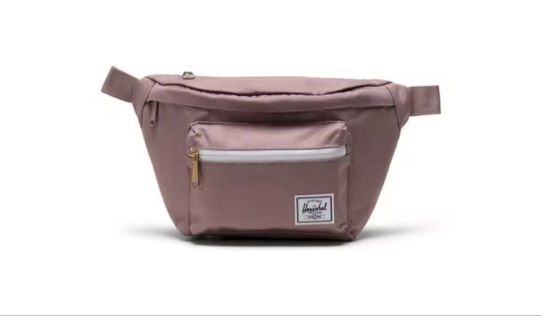Herschel Pop Quiz Hip Pack Waistpack (Category: Belt bags, Clutches and Pouches) located in Taguig. Submitted by jaydjahs0220 (Listing ID 1424323698, Image 1). Description: Herschel Pop Quiz Hip Pack Waistpack in Ash Rose. This waistpack features a front pocket with a white zipper and a main compartment with a zipper closure. The bag has the Herschel logo on the front. It is a 3.5L bag..
