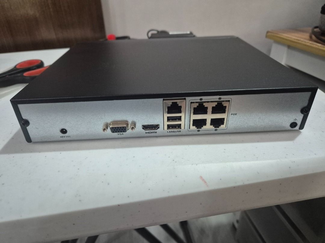 Hikvision Network Video Recorder with 1TB HDD (Category: Security Systems & CCTV Cameras) located in Quezon City. Submitted by martn. (Listing ID 1424277545, Image 3). Description: Model: HWN-2104MH-4P Inclusion: Seagate Skyhawk ST1000VX005 1TB 3.5 Hard Disk Drive - Hikvision Network Video Recorder (NVR) with 1TB Seagate SkyHawk hard drive. - Features multiple Ethernet ports. - Includes HDMI and VGA ports. - Comes with a power adapter. - Sleek bl
