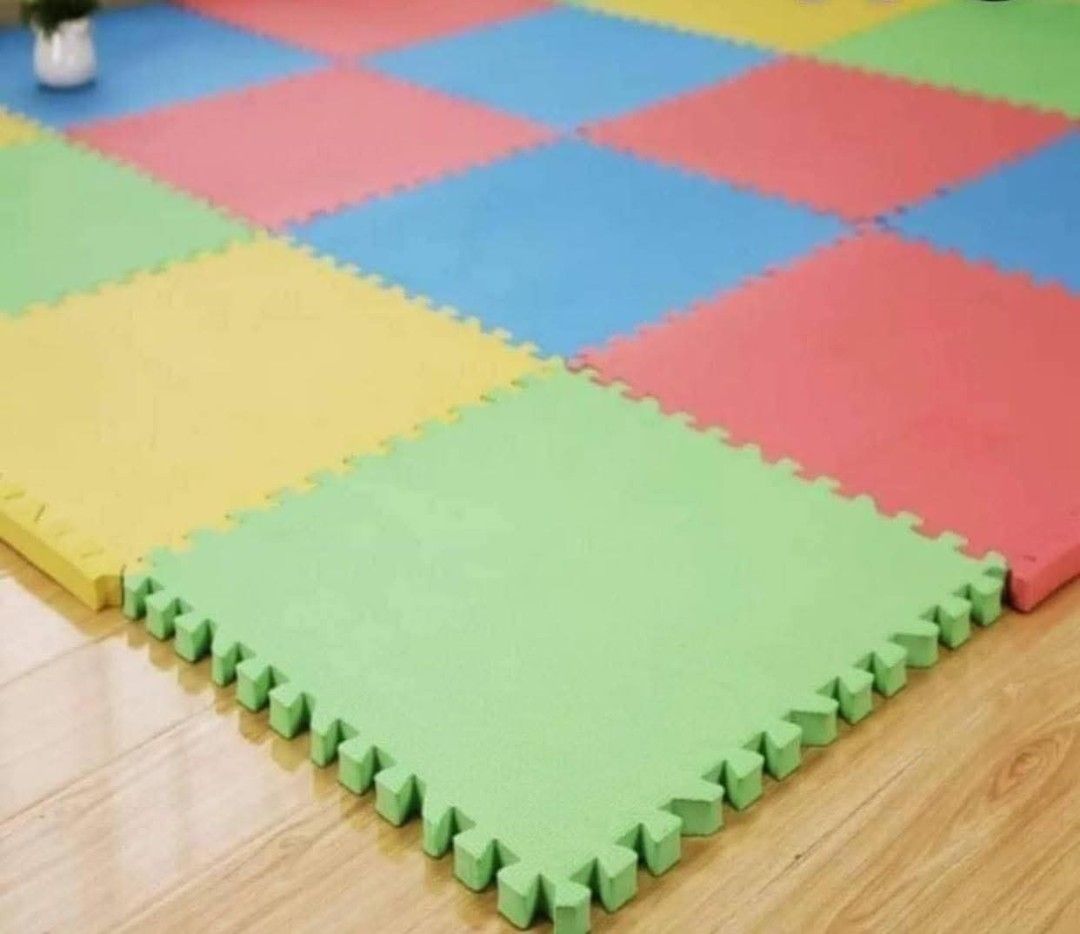 Interlocking Foam Play Mat (Category: Infant Playtime) located in Manila. Submitted by nixdcruz (Listing ID 1424294897, Image 3). Description: Interlocking foam play mat is perfect for creating a safe and comfortable play area. Each tile measures 60cm x 60cm. The set includes various colors like red, blue, yellow, and green. It's ideal for babies and toddlers, providing a soft surface for playtime and protecting against bumps and falls. Easy to a