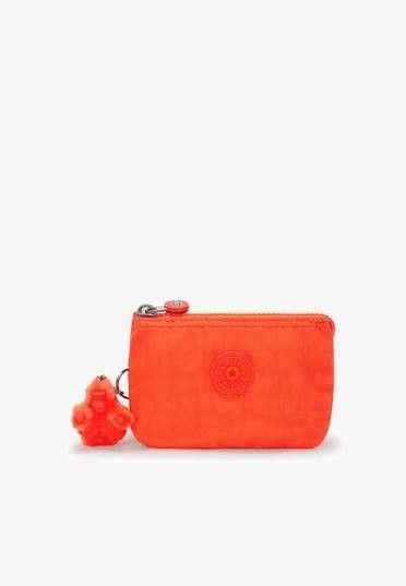 Kipling Creativity S Open Orange Purse (Category: Purses & Pouches) located in Davao. Submitted by jilly07 (Listing ID 1424268180, Image 1). Description: - Vibrant orange Kipling coin purse - Zippered closure - Includes a small monkey keychain - Orange interior with Kipling logo - Compact size, ideal for small essentials Brand New with Tags Bought in Kipling 🇺🇲 RFS: decluttering ❌No COD/COP as I am a full time worker ❌Joy/Bogus buyer/reserver w