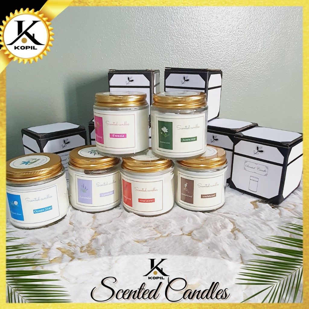 KOPIL Scented Candles - Various Scents (Category: Home Fragrance) located in Manila. Submitted by lalec (Listing ID 1424336835, Image 2). Description: Scented candles with dry flowers by Kopil CGT -Available in a variety of mood-boosting scents including sandalwood, jasmine, lavender, rose, freesia, and vanilla. -Each candle is presented in a glass jar with a gold lid. -The candles are decorated with dried flower petals. Perfect for creating a re
