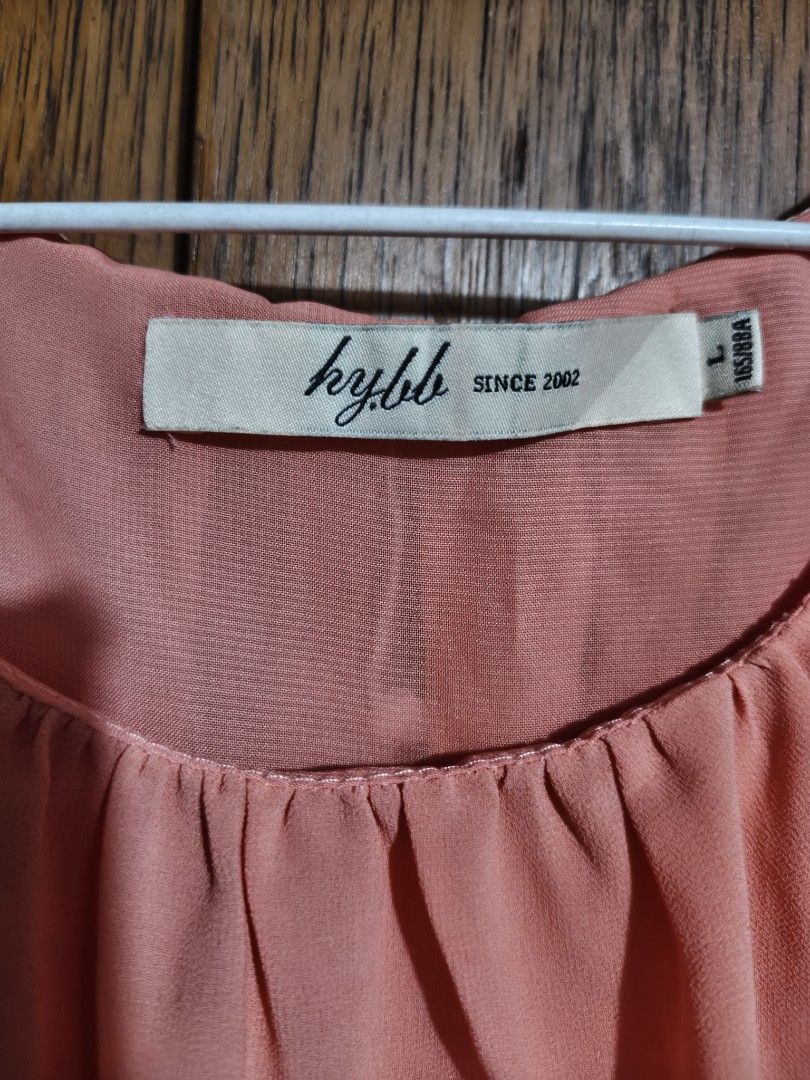 ky.bb Peach Dress (Category: Dresses) located in Manila. Submitted by anneesp (Listing ID 1424225922, Image 3). Description: - Ky.bb peach dress - Size: L - Sleeveless design - Gathered neckline - Elasticated waist - High-low hemline - Lightweight, flowy fabric - Ideal for casual and special occasions #dress #semiformaldress #cocktaildress #chiffondress #womensfashion #fashion #fyp.