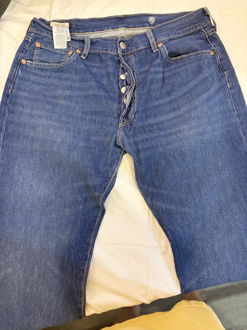 Levi's Premium 501 Button Fly Jeans W36 L32 (Category: Jeans) located in Manila. Submitted by og1022 (Listing ID 1424330734, Image 2). Description: - Levi's Premium 501 Jeans - Classic blue wash - Size: W36 L32 - Button fly closure - Features the Levi's Premium label - "COOL" logo on the back.