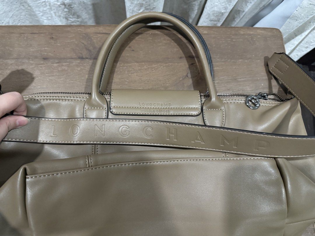 Longchamp Le Pliage Cuir leather handbag (Category: Luxury Bags & Wallets) located in Cebu City. Submitted by refabph (Listing ID 1424325453, Image 2). Description: Longchamp Le Pliage Cuir leather handbag.