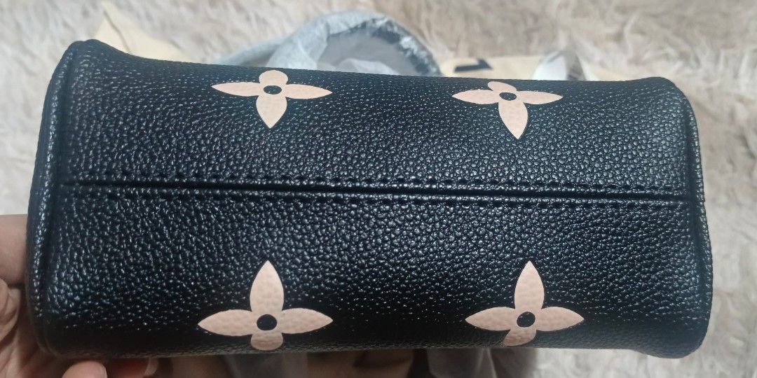 Louis Vuitton Nano Speedy (Category: Luxury Bags & Wallets) located in Makati City. Submitted by tin_erwin (Listing ID 1410211646, Image 3). Description: -mini -no box anymore pero may dust bag - never been used bagong-bago pa - 99% elite (Japan) - It has two straps - RFS: I need funds.
