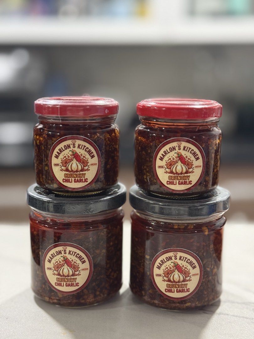 Marlon's Kitchen Crunchy Chili Garlic (Category: Spice & Seasoning) located in Taguig. Submitted by allthings.loved (Listing ID 1424340723, Image 2). Description: Special and Homemade Chili Garlic Best chili garlic you’ll ever have! Delicious crunchy chili garlic from Marlon's Kitchen. Available in jars, perfect for adding a spicy kick to your meals. The jars are sealed and ready to enjoy. Great for gifting or personal use. Can go with a clear ba