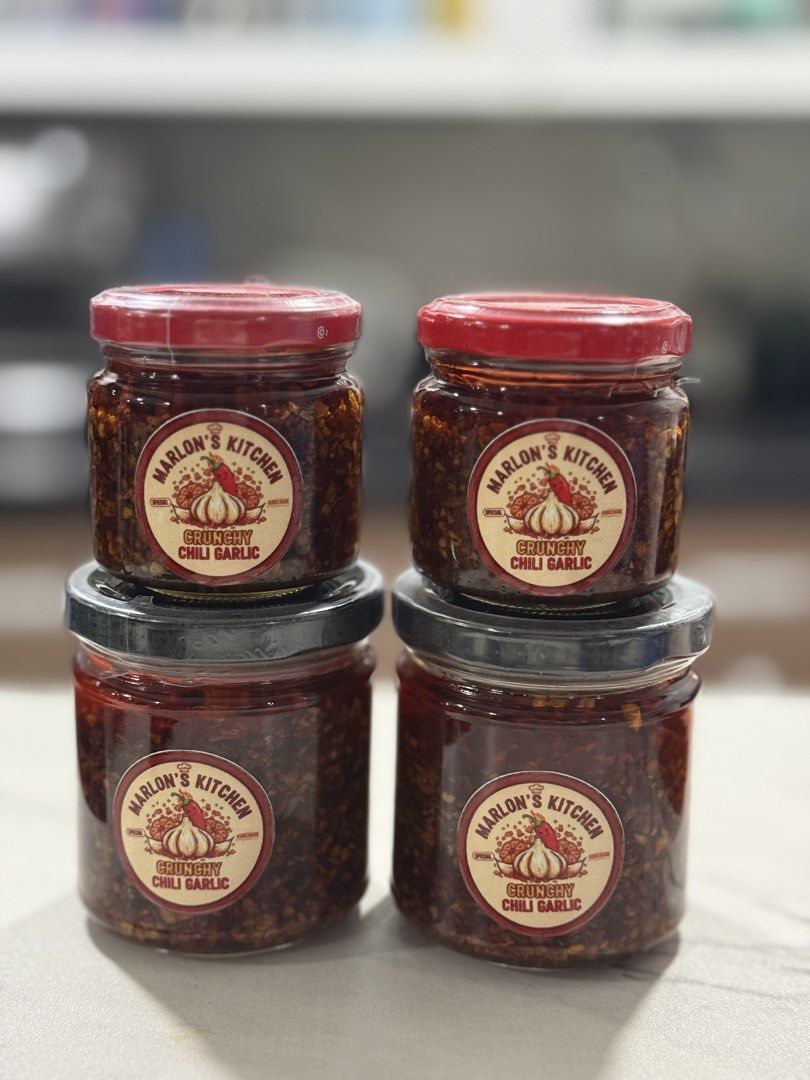 Marlon's Kitchen Crunchy Chili Garlic (Category: Spice & Seasoning) located in Taguig. Submitted by allthings.loved (Listing ID 1424340723, Image 3). Description: Special and Homemade Chili Garlic Best chili garlic you’ll ever have! Delicious crunchy chili garlic from Marlon's Kitchen. Available in jars, perfect for adding a spicy kick to your meals. The jars are sealed and ready to enjoy. Great for gifting or personal use. Can go with a clear ba