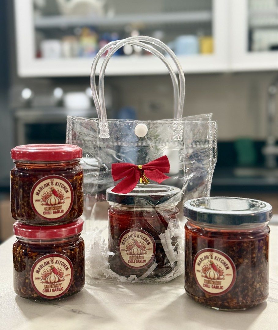Marlon's Kitchen Crunchy Chili Garlic (Category: Spice & Seasoning) located in Taguig. Submitted by allthings.loved (Listing ID 1424340723, Image 1). Description: Special and Homemade Chili Garlic Best chili garlic you’ll ever have! Delicious crunchy chili garlic from Marlon's Kitchen. Available in jars, perfect for adding a spicy kick to your meals. The jars are sealed and ready to enjoy. Great for gifting or personal use. Can go with a clear ba