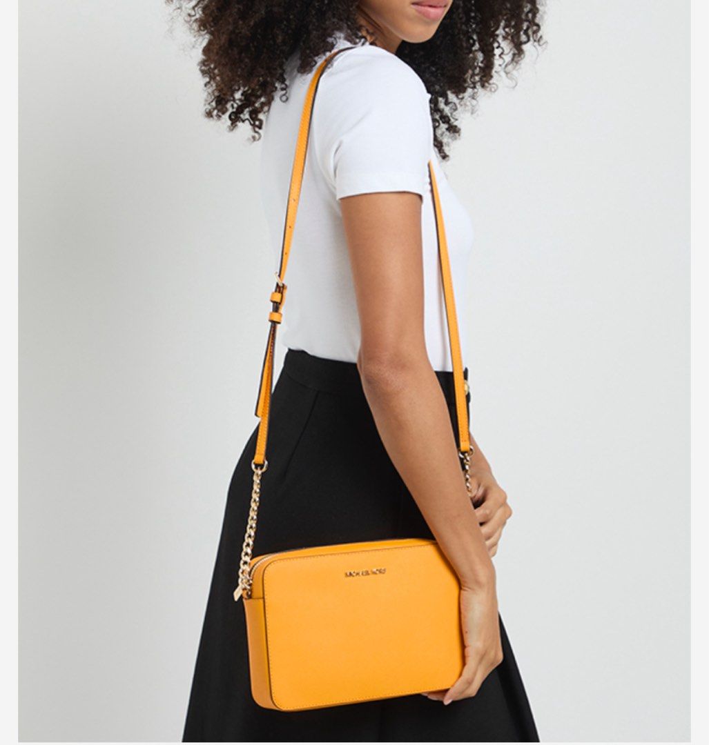Michael Kors Jet set crossbody bag (Category: Luxury Bags & Wallets) located in Rizal. Submitted by reginaflorence (Listing ID 1424261809, Image 2). Description: Authentic From US Last price posted, NO LOW BALLERS.