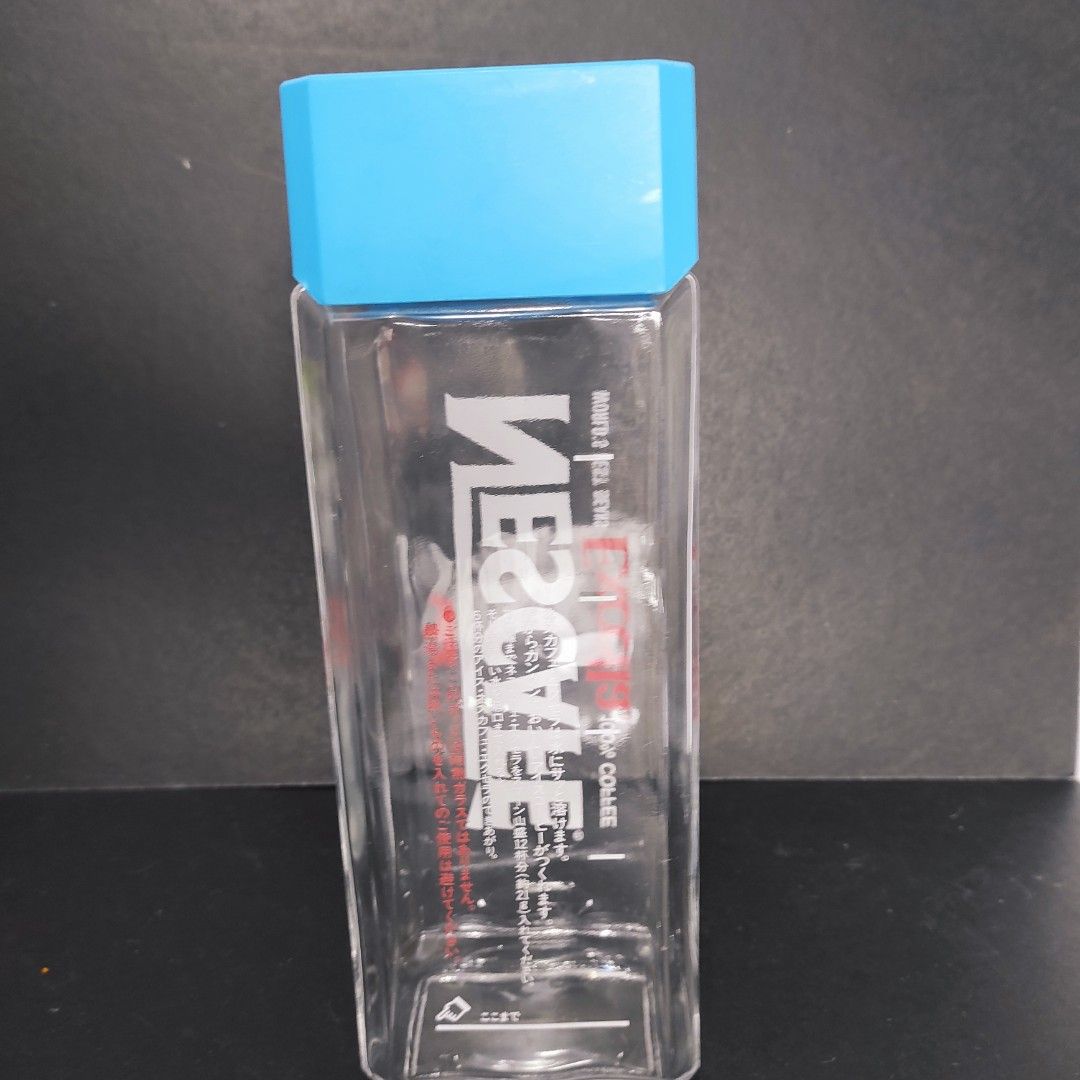 Nescafe Excella Glass Bottle (Category: Water Bottles & Tumblers) located in Cainta. Submitted by fukunekojapansurplus (Listing ID 1424206639, Image 2). Description: 200 pesos no issue Nescafe Excella glass bottle - Blue cap - Rectangular shape - Dimensions: Approximately 10cm (length) x 4cm (width) - Clear bottle - Features Nescafe logo and "World's Best Beans" print ✨ A quick Yes or No after inquiry is appreciated ✨ 📍 Mayfield Park Residences 