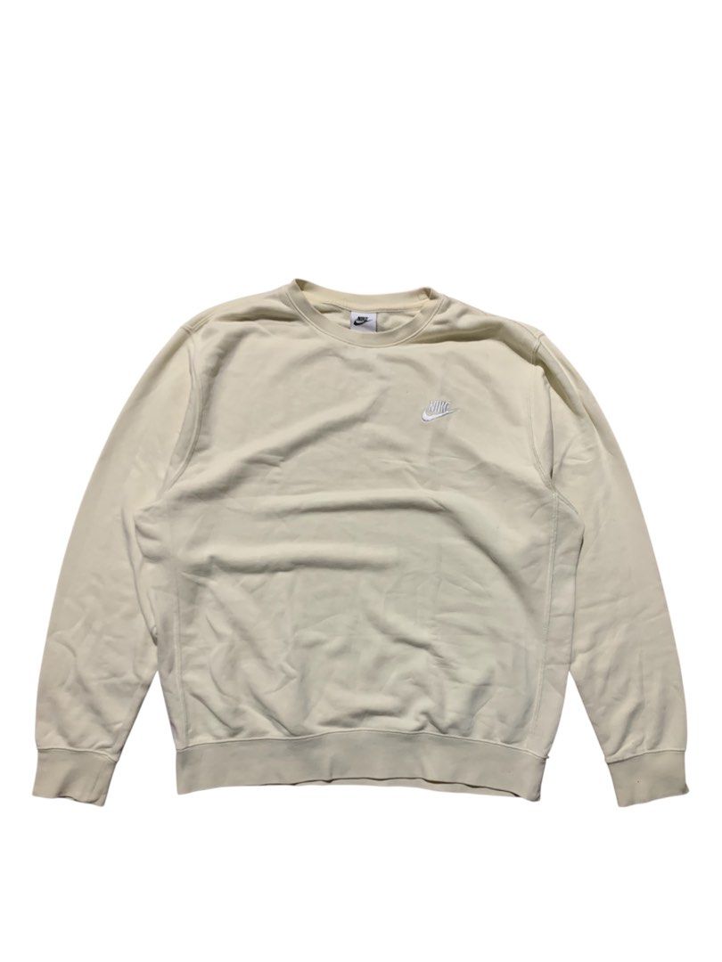 Nike Crewneck Sweatshirt - Cream (Category: Coats, Jackets and Outerwear) located in Butuan. Submitted by rcycl (Listing ID 1424274765, Image 1). Description: - Cream-colored Nike crewneck sweatshirt - Features Nike logo on chest - Size: L - Made in China - Material: 80% cotton, 20% polyester - Chest size on care label: 100cm.